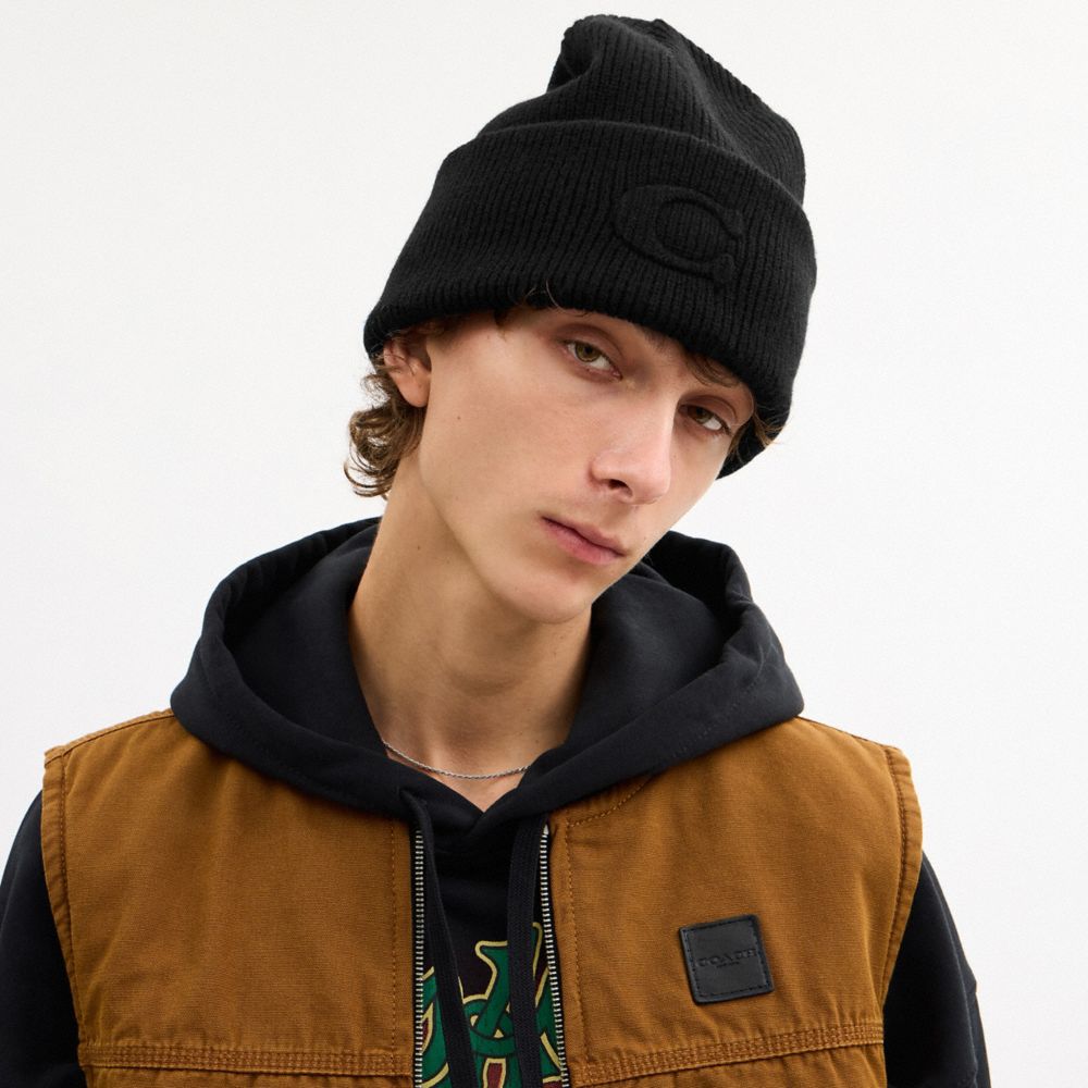 Coach Signature Embossed Knit Beanie In Black