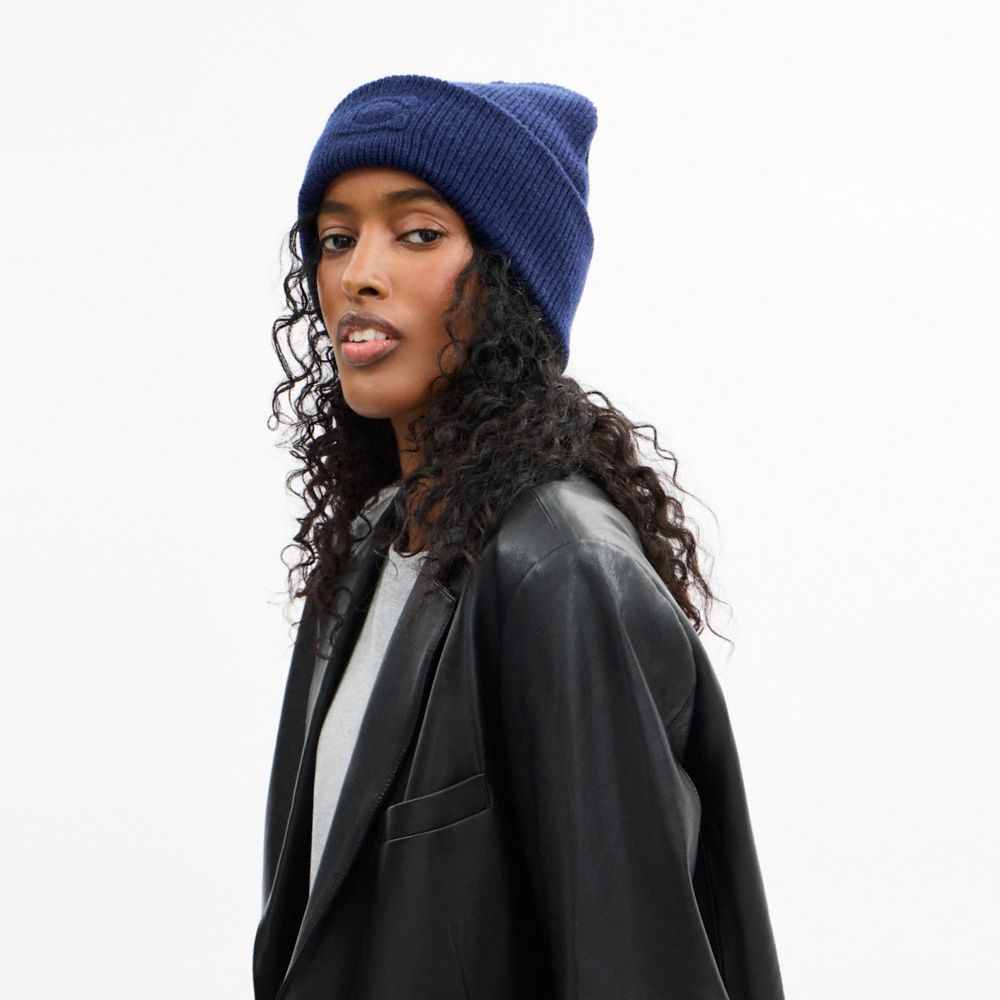 Coach Signature Embossed Knit Beanie In Blue