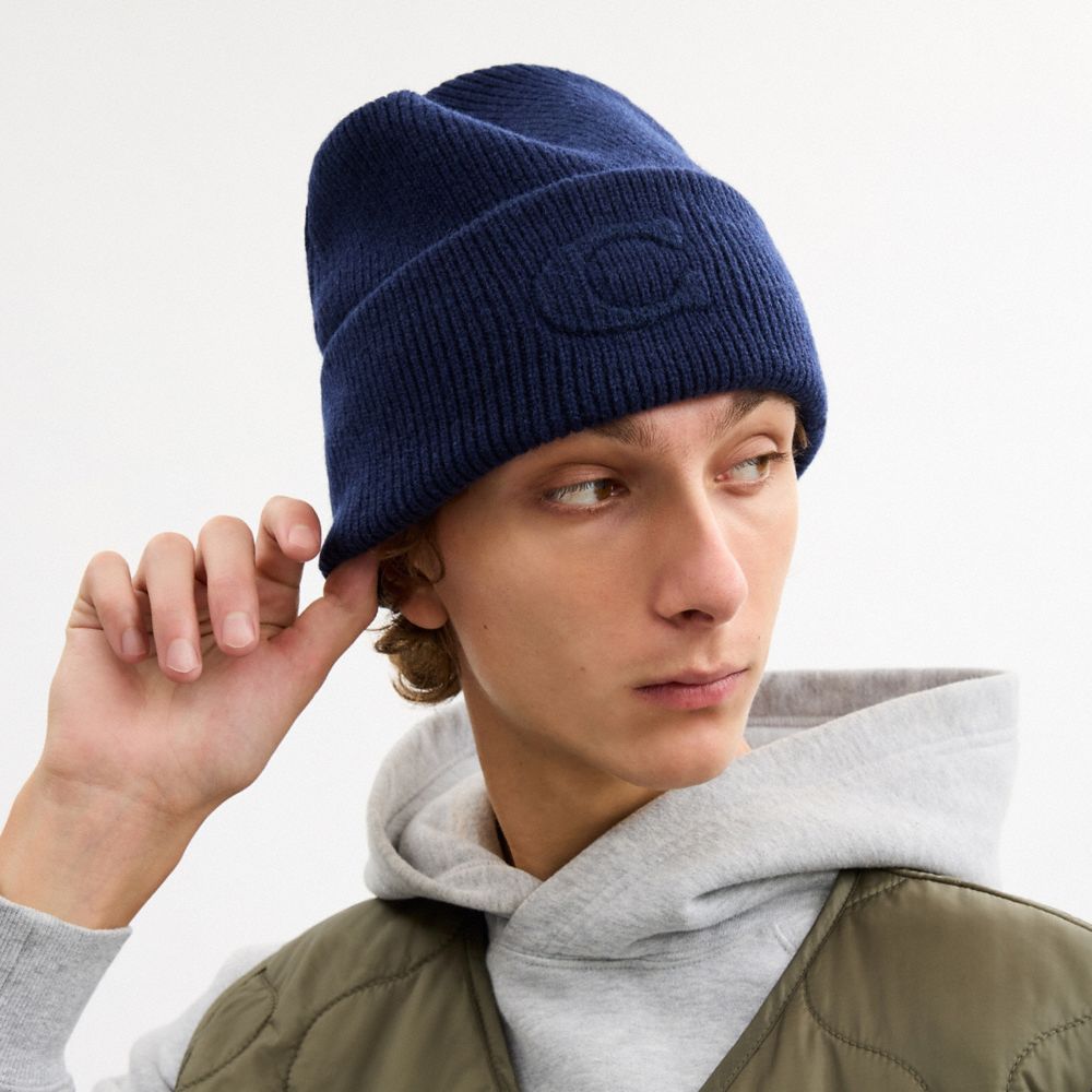 Coach Signature Embossed Knit Beanie In Blue