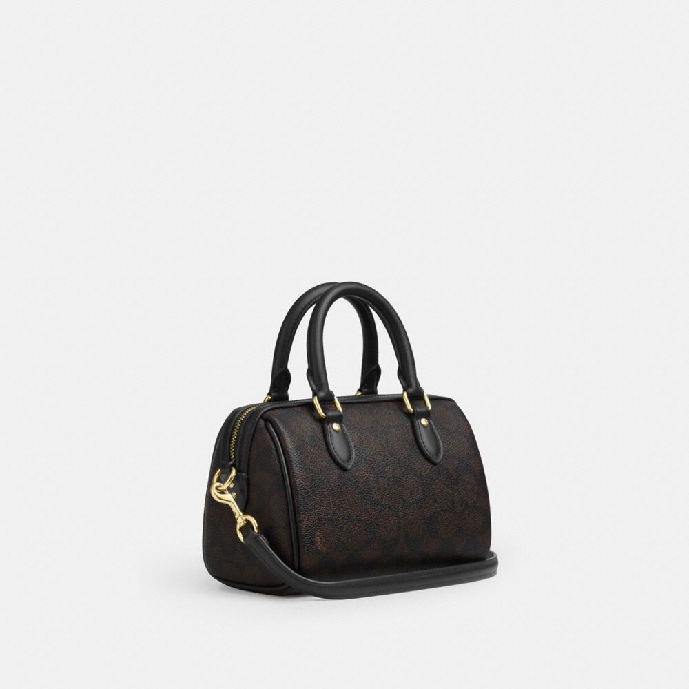 COACH®,Boxed Mini Rowan Crossbody Bag And Mirror Bag Charm Set In Signature Canvas,Brown,Angle View