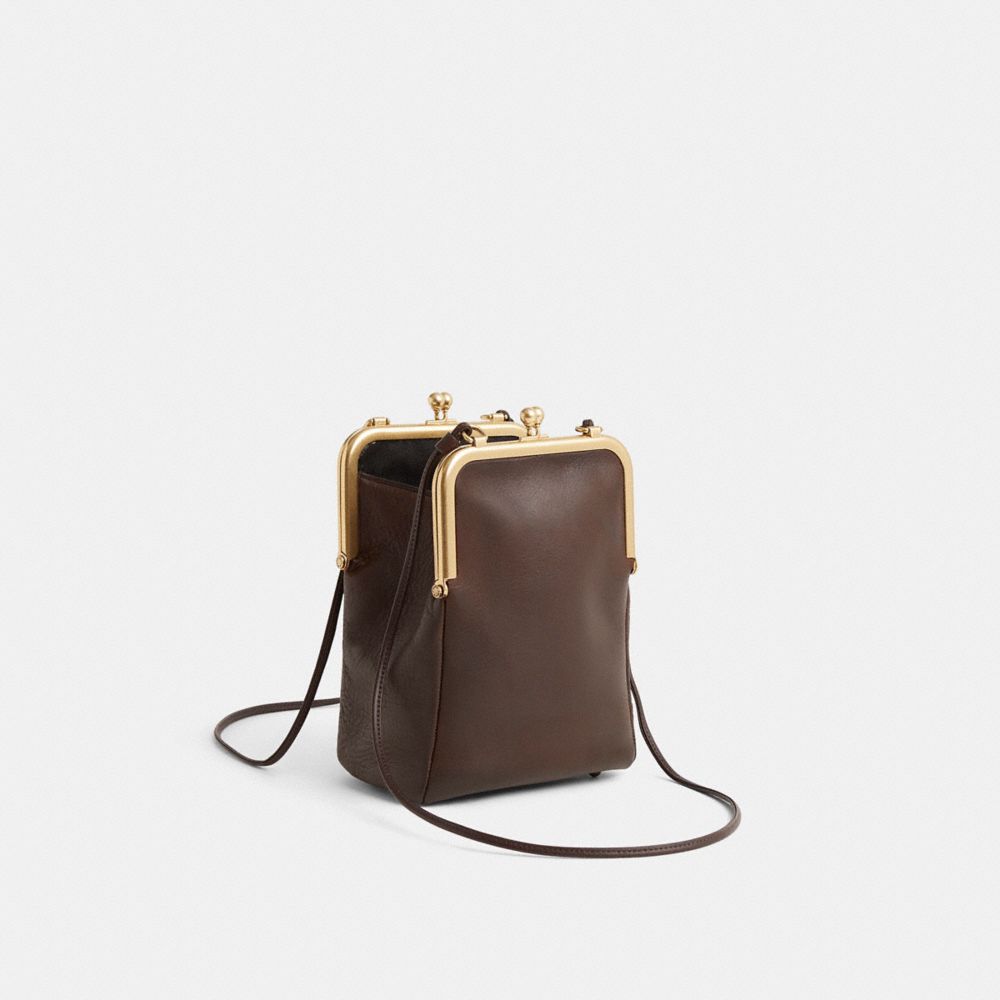 COACH®,Vintage Bonnie Cashin Double Kisslock Swinger Bag,,Angle View