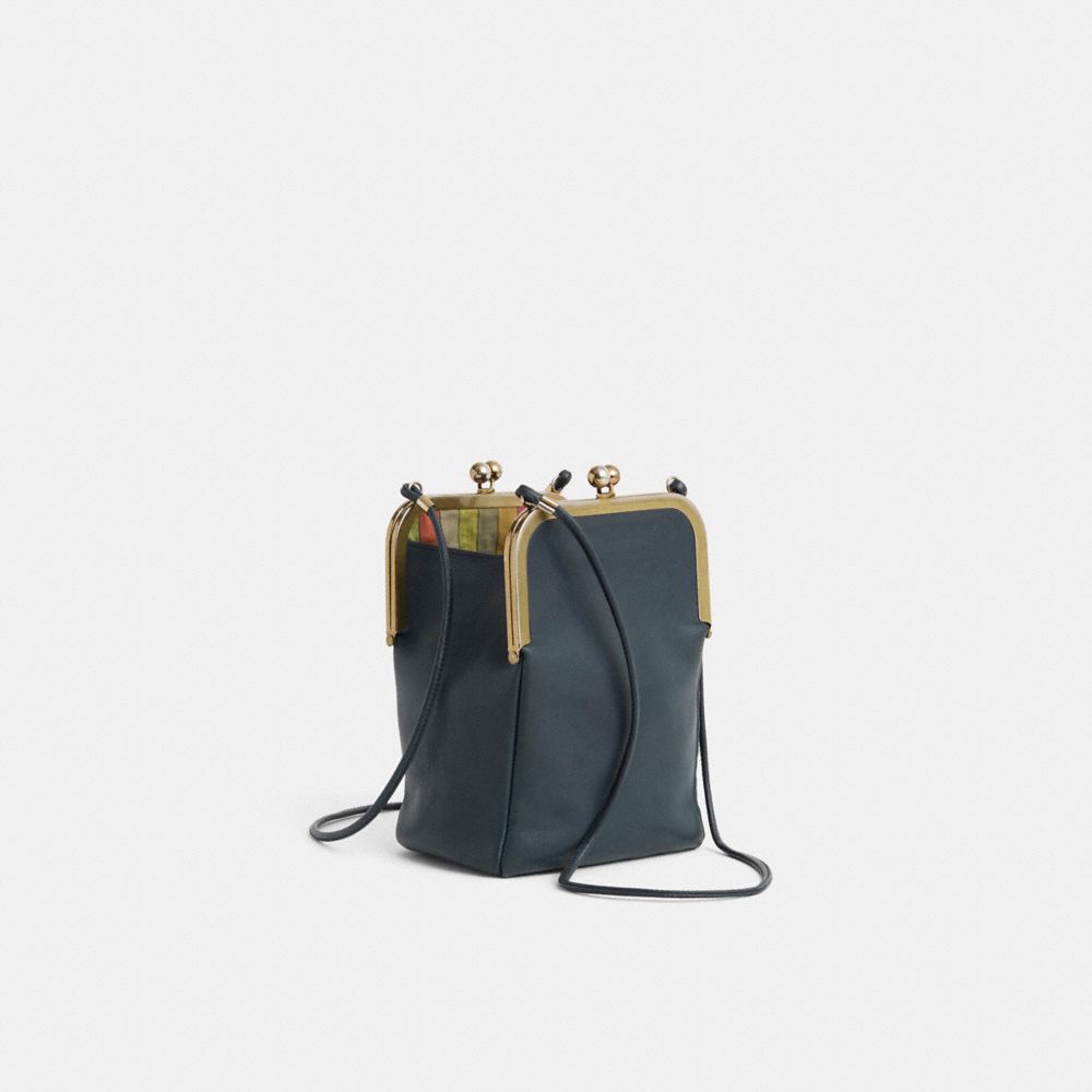 COACH®,Vintage Bonnie Cashin Double Kisslock Swinger Bag,,Angle View