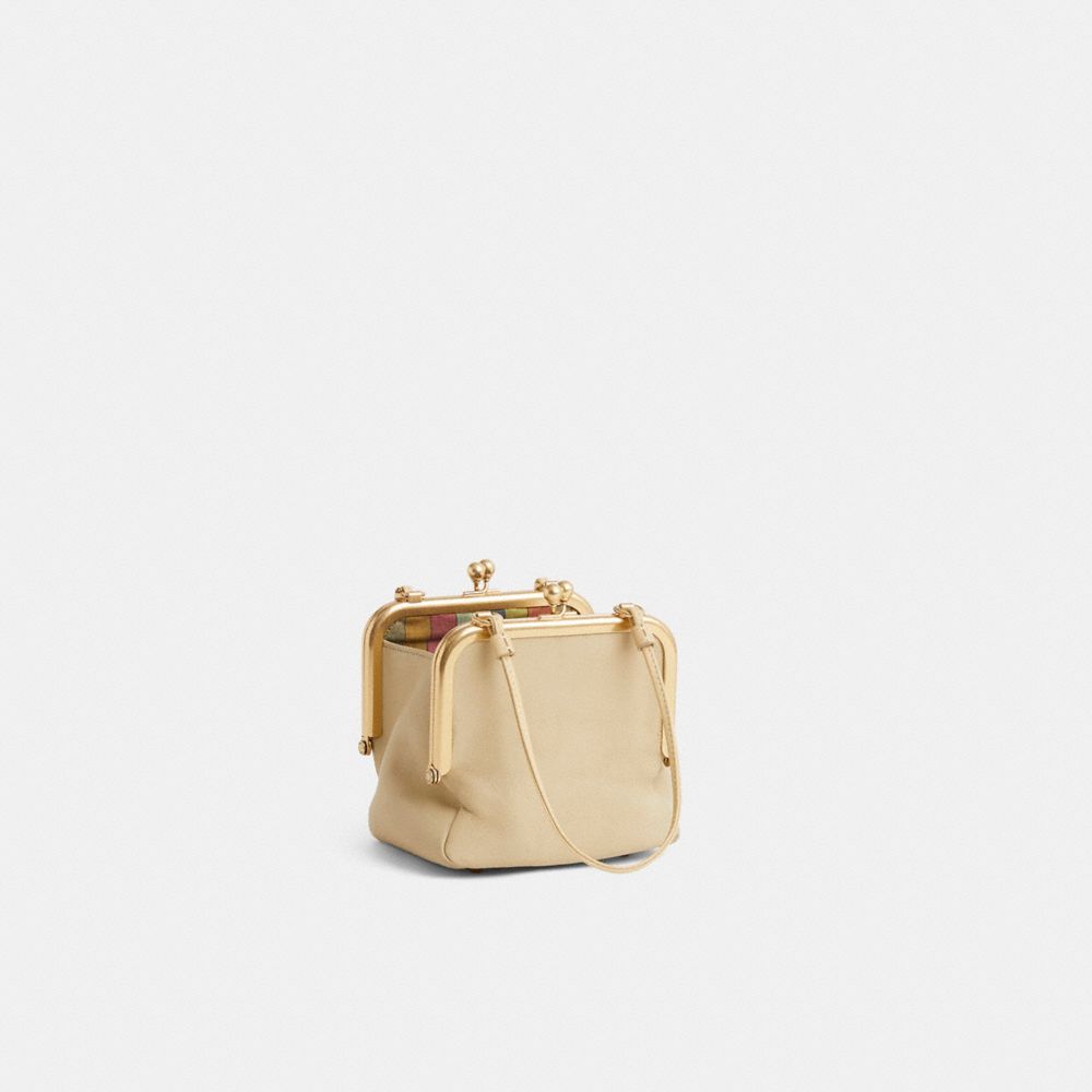 COACH®,Vintage Bonnie Cashin Mini Cashin Carry Double Kisslock Bag,,Angle View