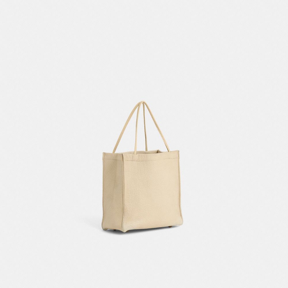 COACH®,Vintage Bonnie Cashin Tiny Tote,Cream,Angle View