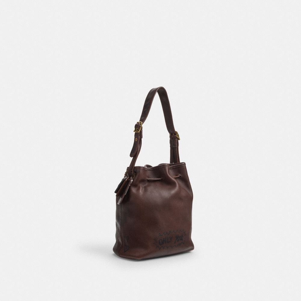 COACH®,Upcrafted Vintage Legacy Drawstring Bag,,Angle View