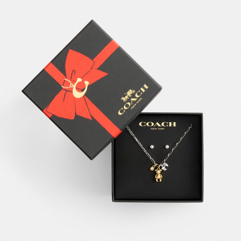 COACH®,Teddy Bear And Bow Earrings And Necklace Set,White,Clear,Outsole View