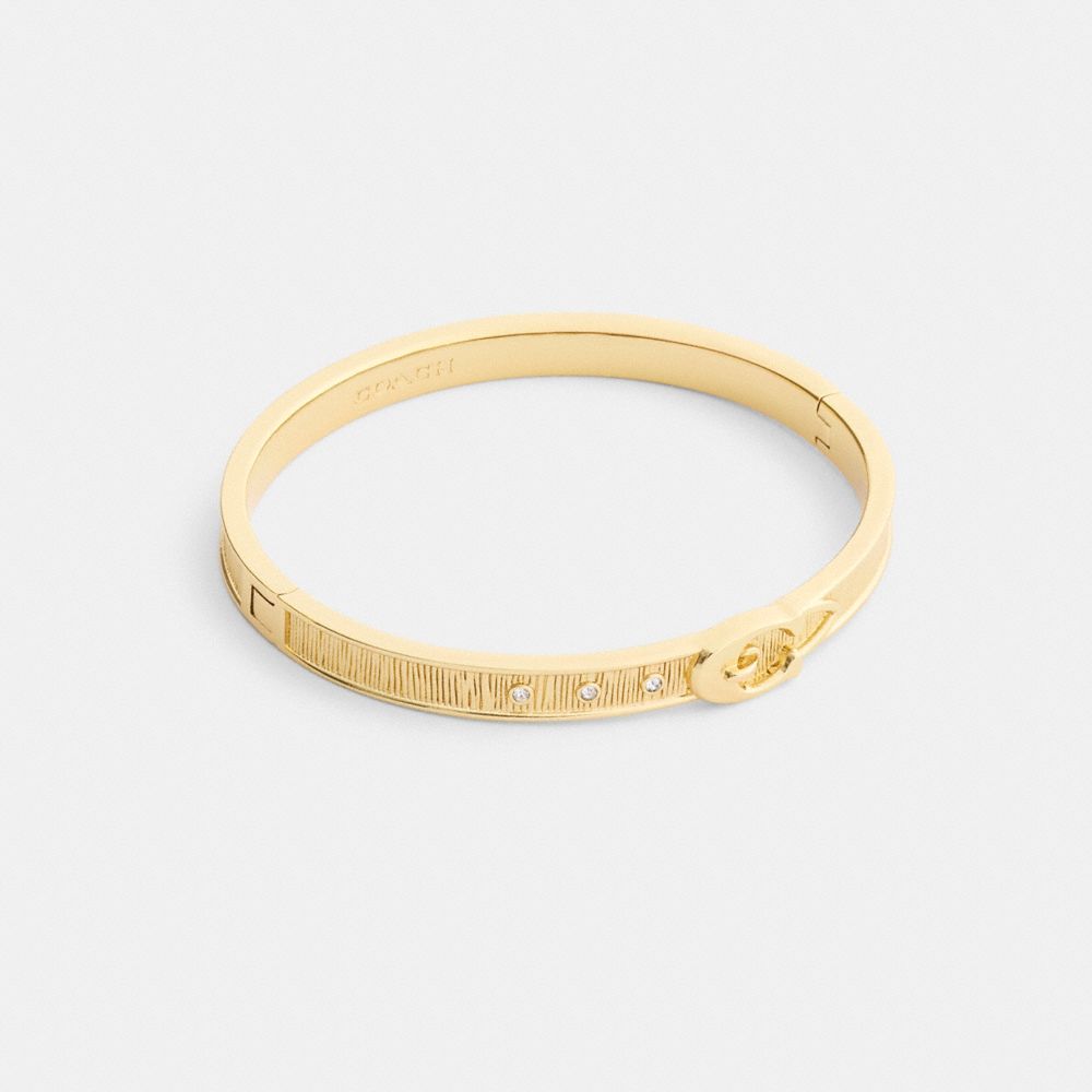 Coach Brushed Buckle Hinged Bangle In Gold