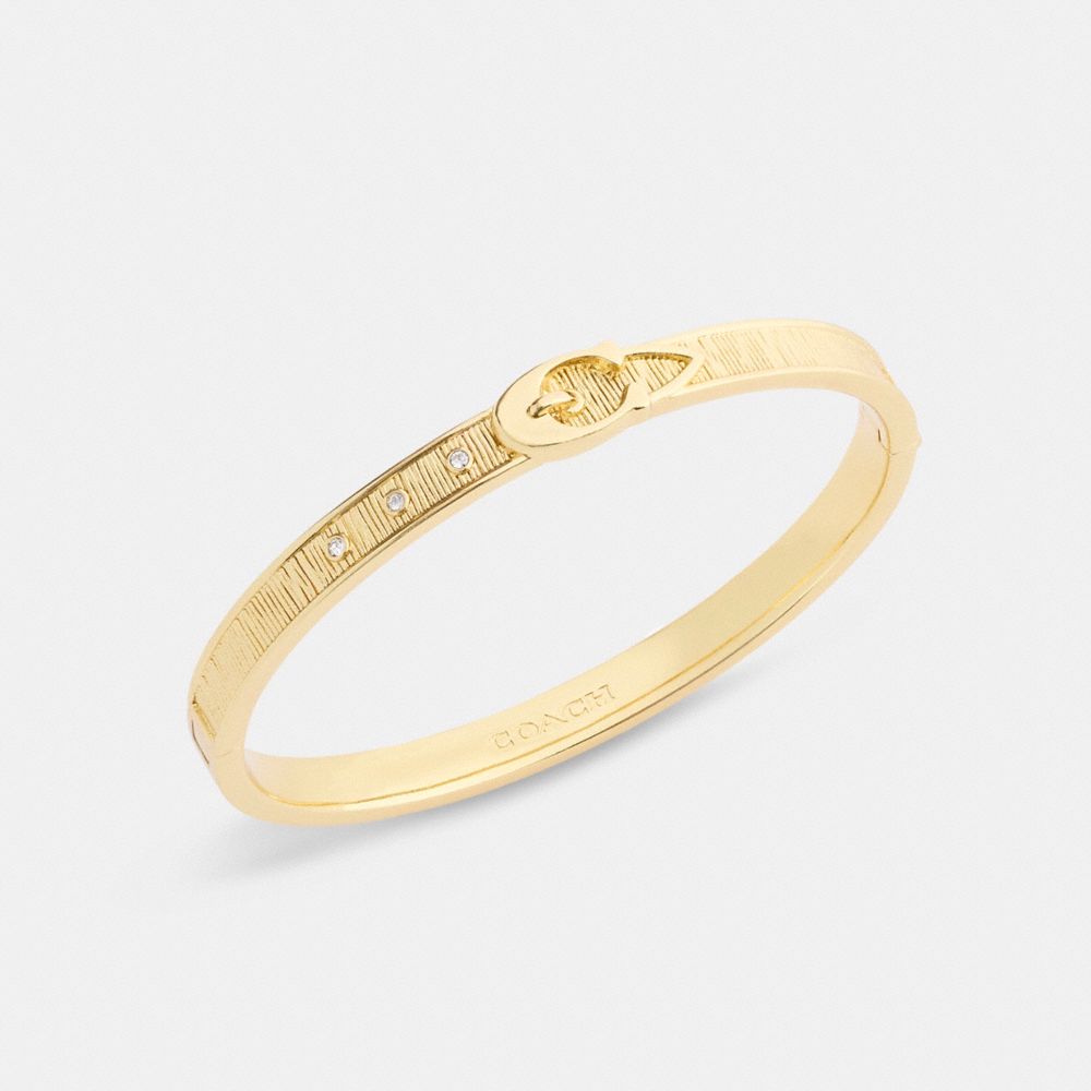 Coach Brushed Buckle Hinged Bangle In Gold