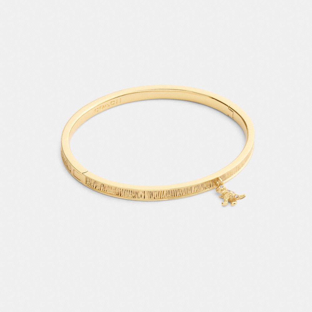 Coach Brushed Rexy Charm Hinged Bangle In Gold
