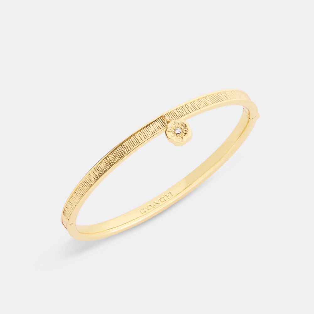 Coach Brushed Tea Rose Hinged Bangle In Gold