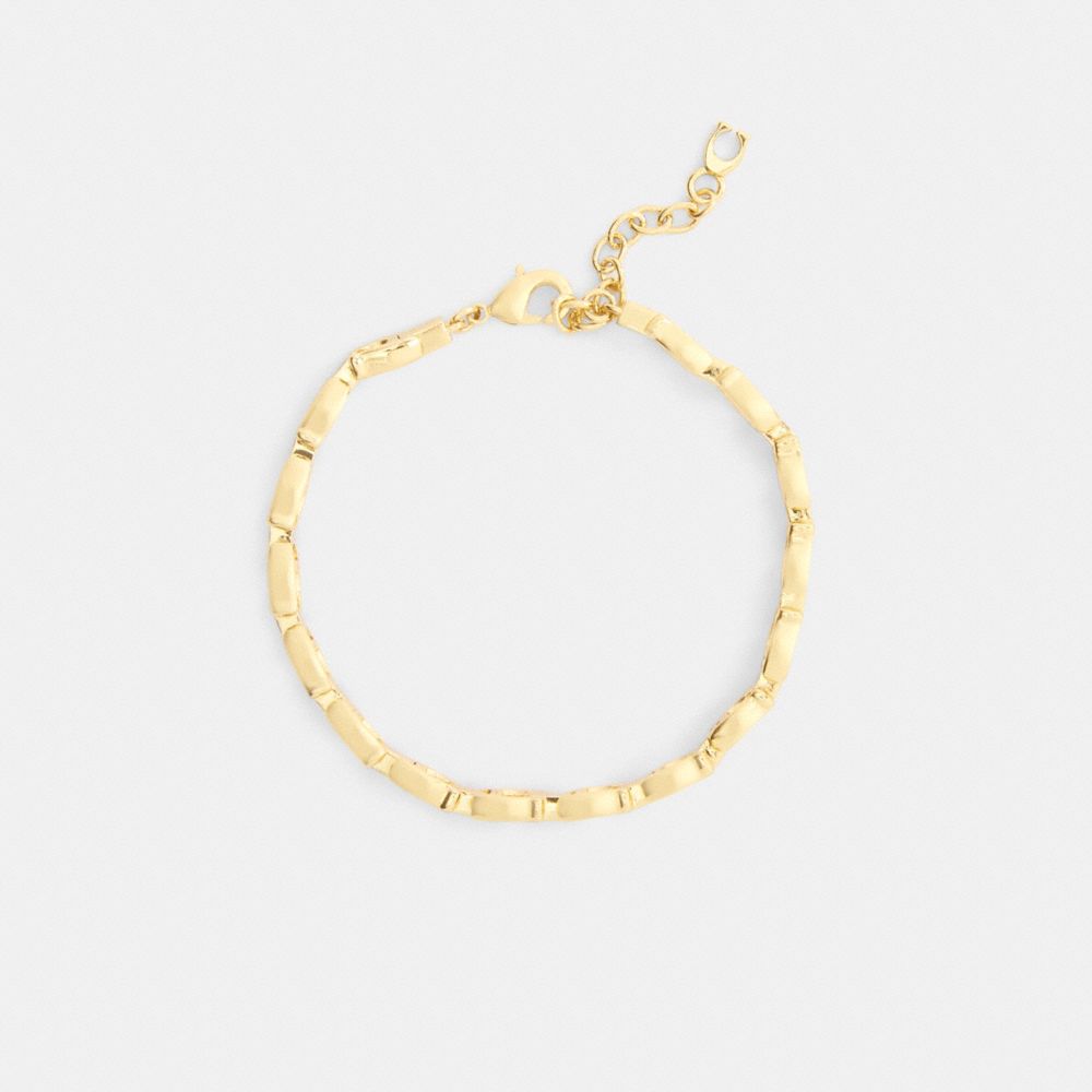 Coach Beveled Signature Link Chain Bracelet In Gold