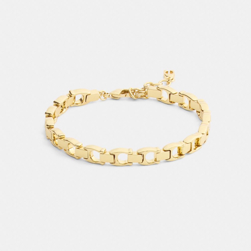 Coach Beveled Signature Link Chain Bracelet In Gold