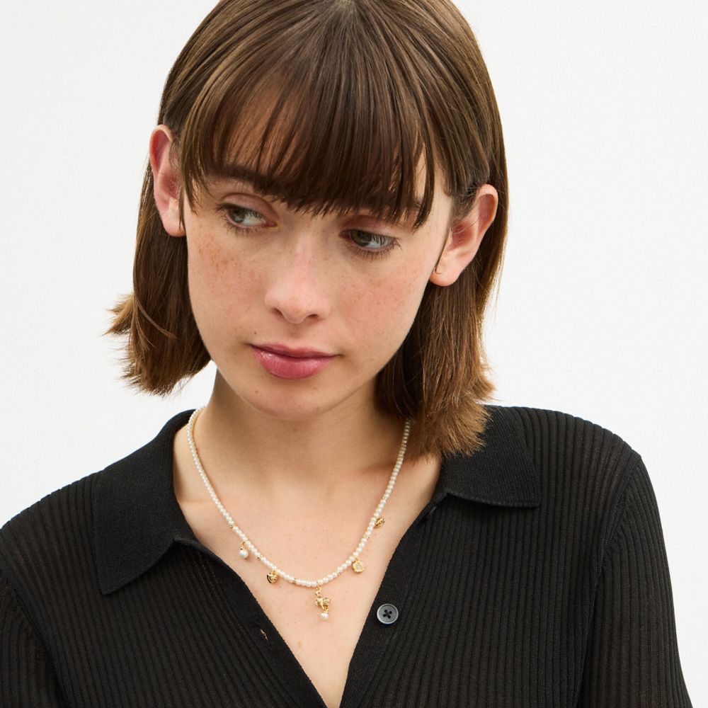 Coach Mini Cat Pearl Charms Necklace In Gold