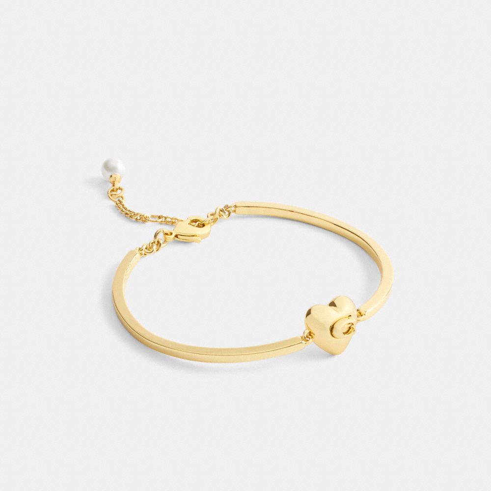 Coach Signature Heart Bracelet In Gold