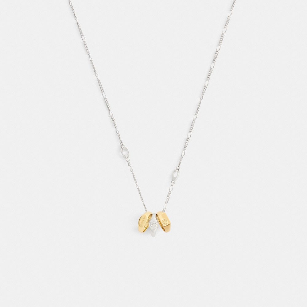 Coach Signet Ring Rondell Pendant Necklace In Gold