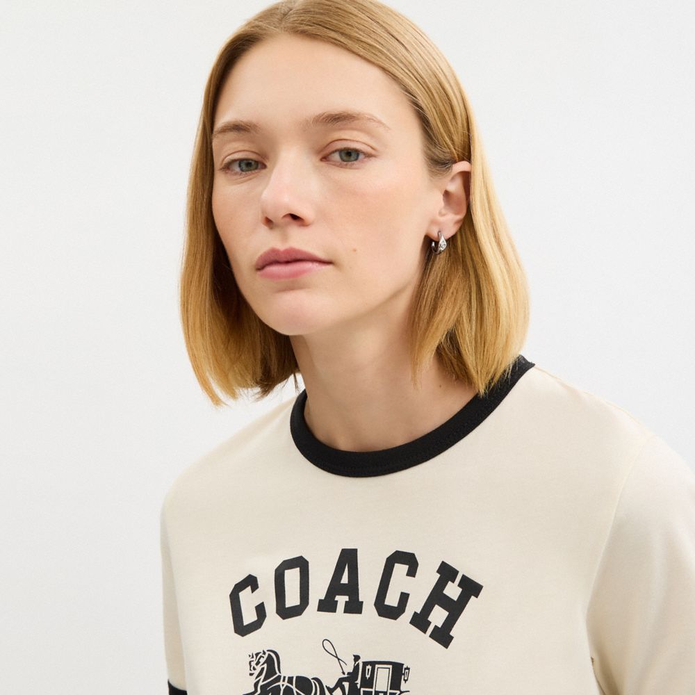 Coach Signet Signature Huggie Earrings In Metallic