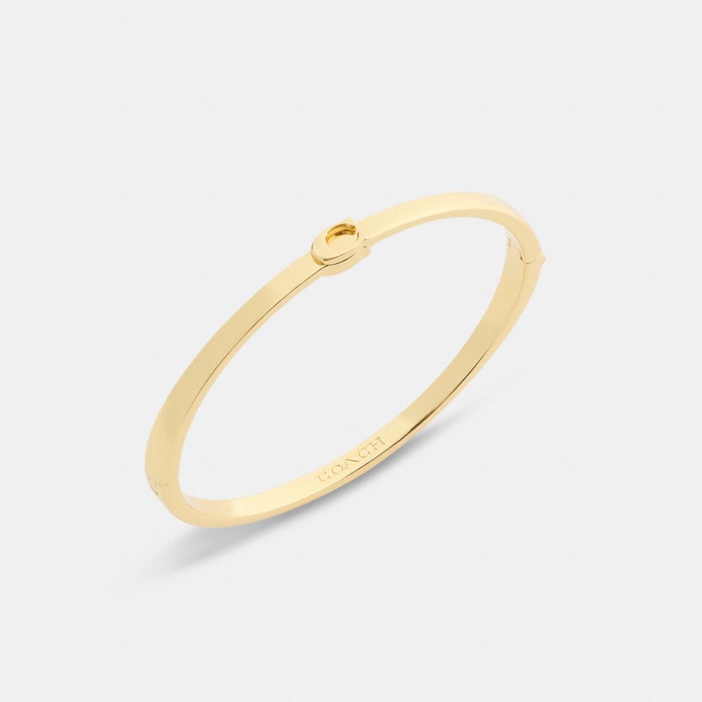 Coach Thin Signature Hinged Bangle In Gold
