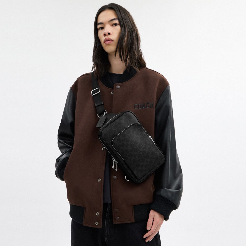 COACH®,Felix Sling Bag In Signature Canvas,Canvas,Fabric,Leather,Mesh,Slingback,Logo,Pattern,Adjustable,Compact,Lined,Brea...,Black,Detail View