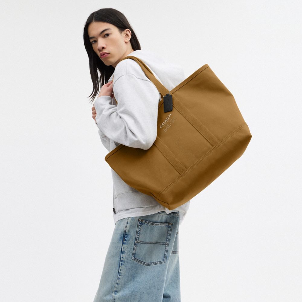 COACH®,Utility Tote,Leather,Cotton,Canvas,Tote,Logo,Word Embellishment,Sustainable,Casual,Brown,Detail View