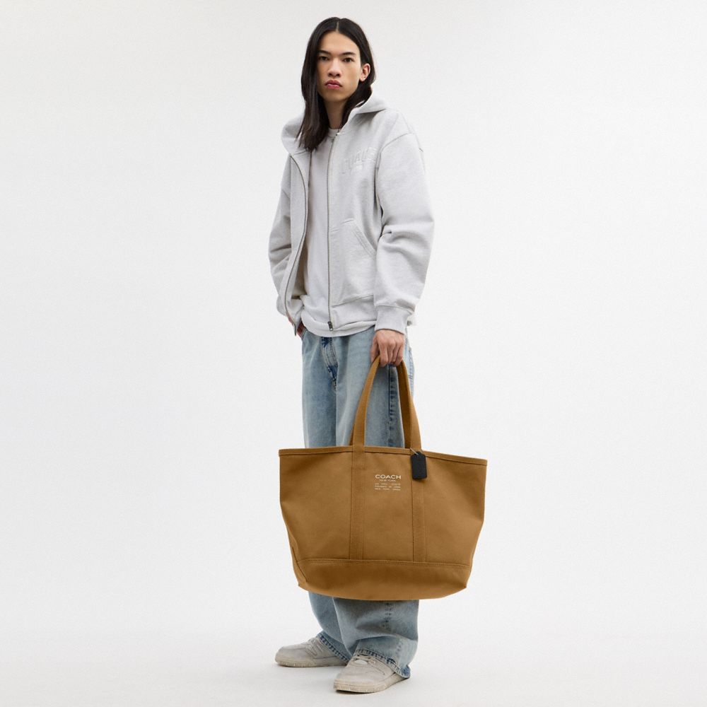 COACH®,Utility Tote,Leather,Cotton,Canvas,Tote,Logo,Word Embellishment,Sustainable,Casual,Brown,Detail View