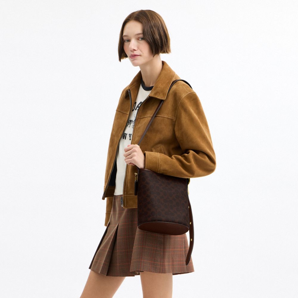Женские сумки Coach Bleecker Bucket Bag 21 In Signature Canvas — фото 7