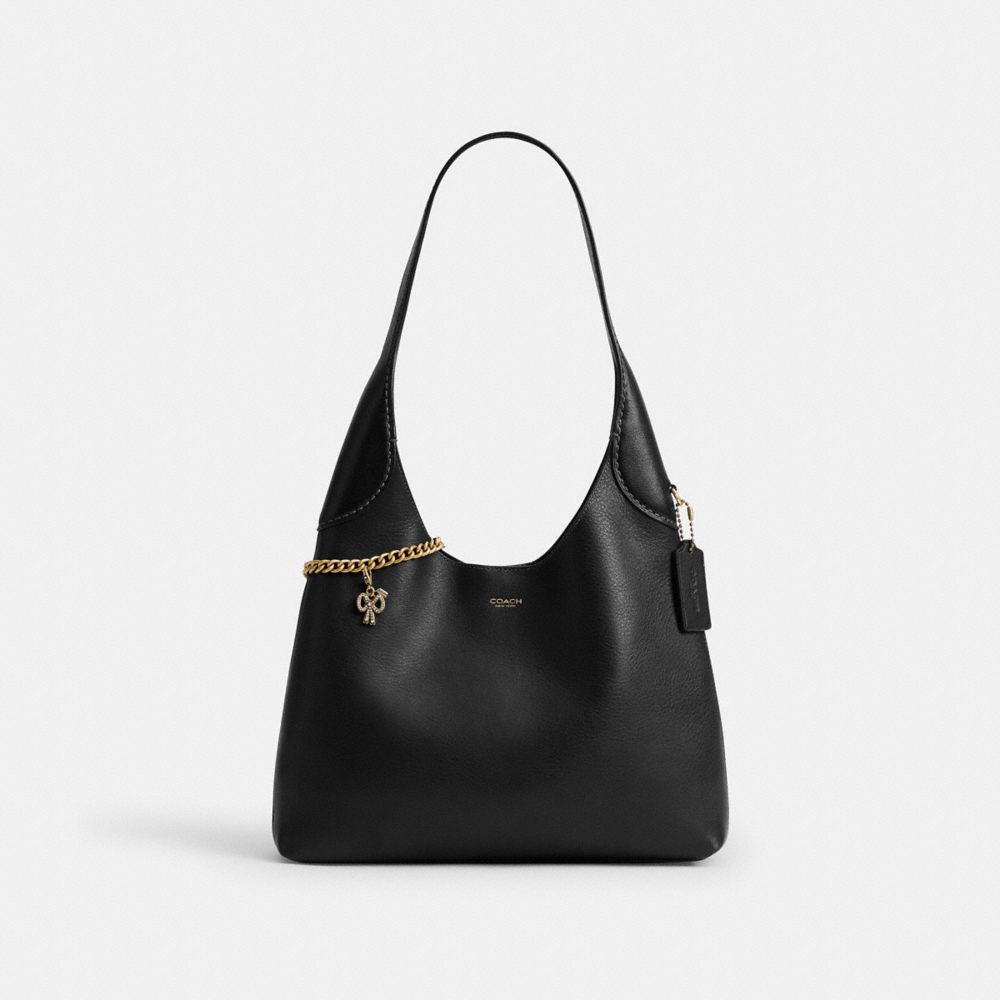 COACH®,DIY Crystal Bow Charm,Bag Charm,Metal Material,Crystal,Bow,Rhinestones,Brass,Gold,Angle View