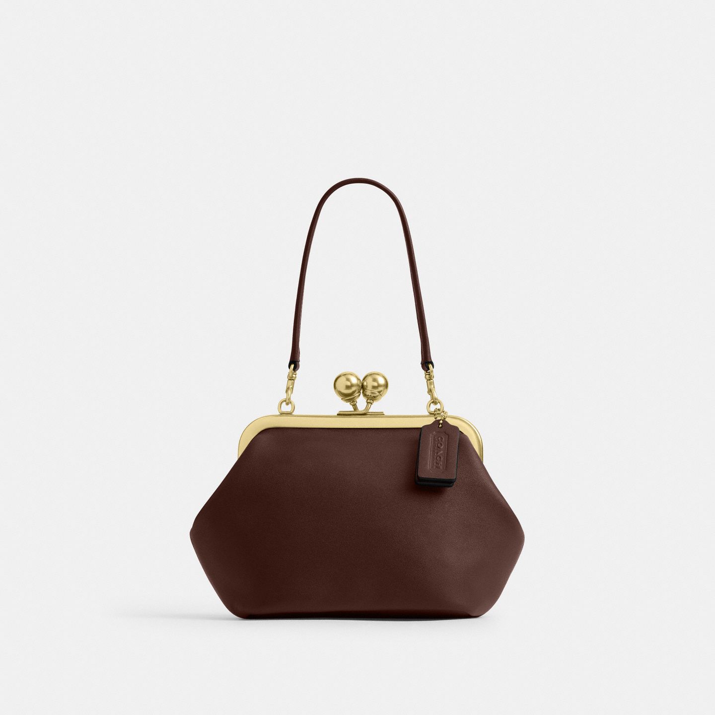 Женская сумка Coach Kisslock Frame Bag 16, цвет: Латунный / Кленовый — фото 1