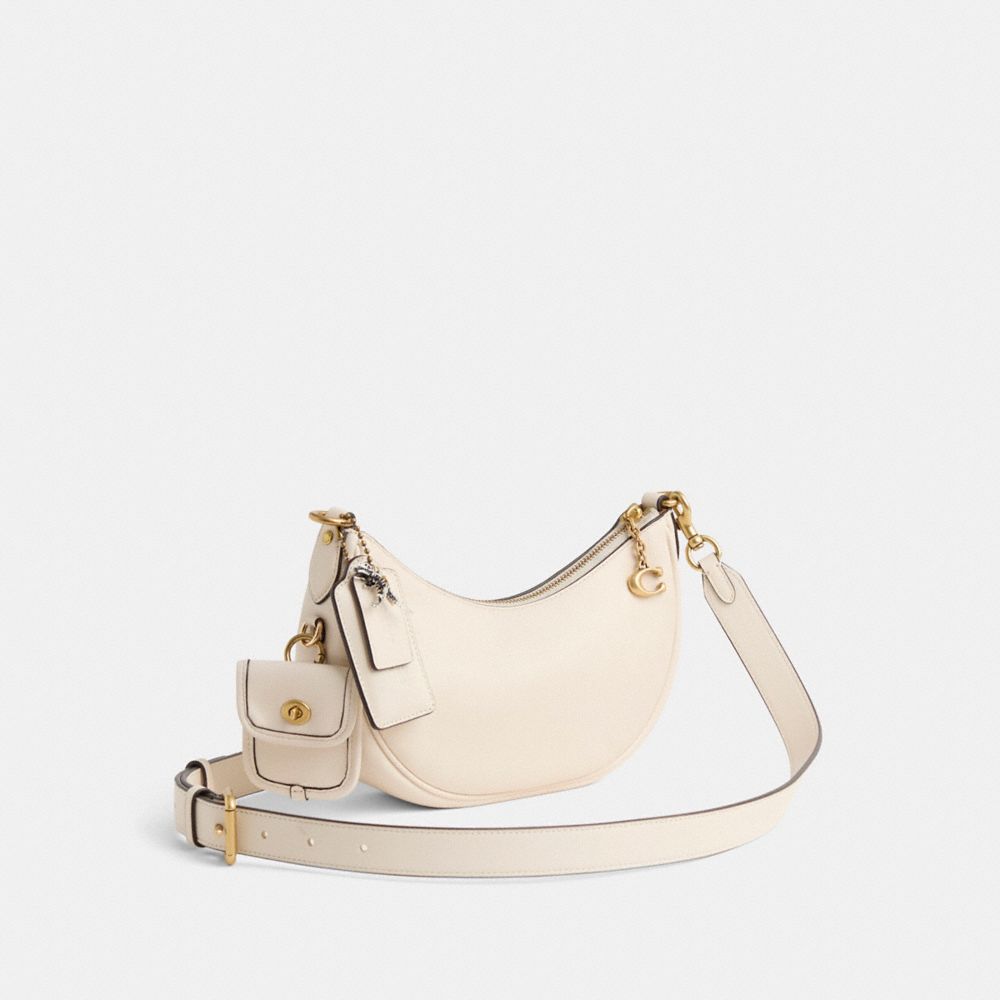 COACH®,Upcrafted Mira Shoulder Bag,Leather,Shoulder Bag,Tag Embellishment,Logo,Metal,Gold Metal,Day Party,Cream,Angle View