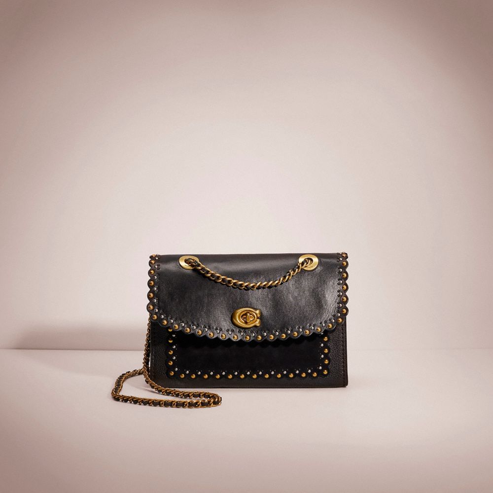 Coach scallop online rivets