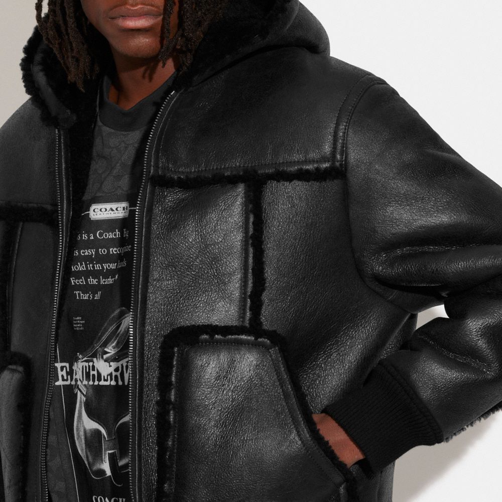 COACH®: Reversible Shearling Hoodie