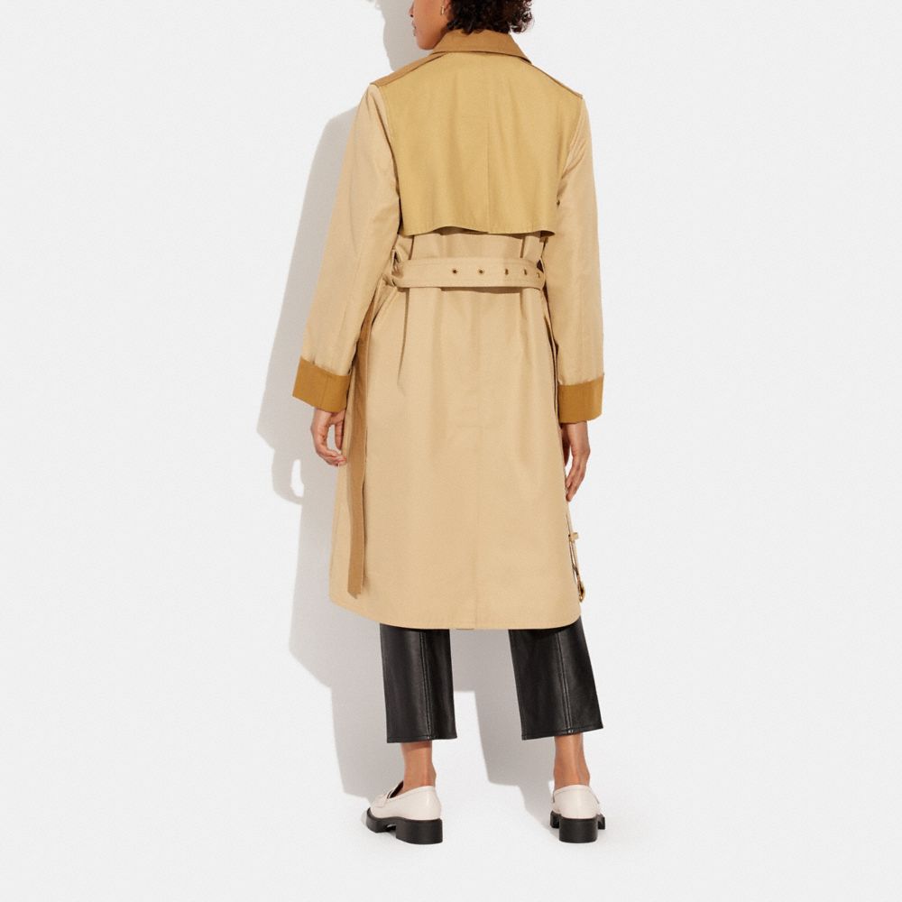 Trench en coton biologique et en polyester recyclé avec verrou tournant