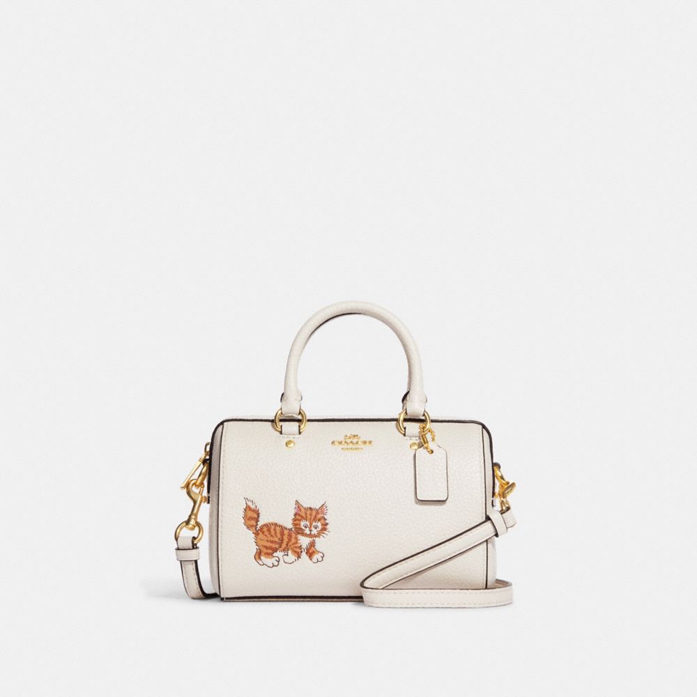 coach dancing cat purse