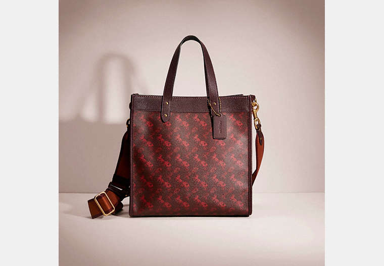 COACH®,RESTORED FIELD TOTE WITH HORSE AND CARRIAGE PRINT,Printed Coated Canvas,Large,Brass/Oxblood Cranberry,Front View