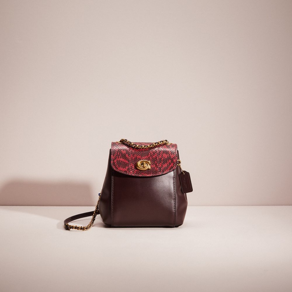 COACH®,RESTORED PARKER CONVERTIBLE BACKPACK 16 WITH SNAKESKIN DETAIL,Smooth Leather,Brass/Deep Red,Front View