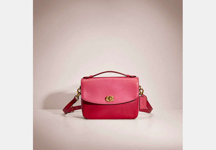 COACH®,RESTORED CASSIE CROSSBODY IN COLORBLOCK,Polished Pebble Leather,Small,Brass/Bright Cherry Multi,Front View
