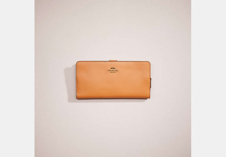 COACH®,RESTORED SKINNY WALLET,Smooth Leather,Medium,Brass/Natural,Front View