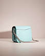 COACH®,RESTORED CASSIE CROSSBODY 19,Polished Pebble Leather,Small,Silver/Faded Blue,Angle View