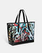 COACH®,COACH X MINT + SERF CARRIAGE TOTE,Pebble Leather,X-Large,Black Multicolor,Angle View