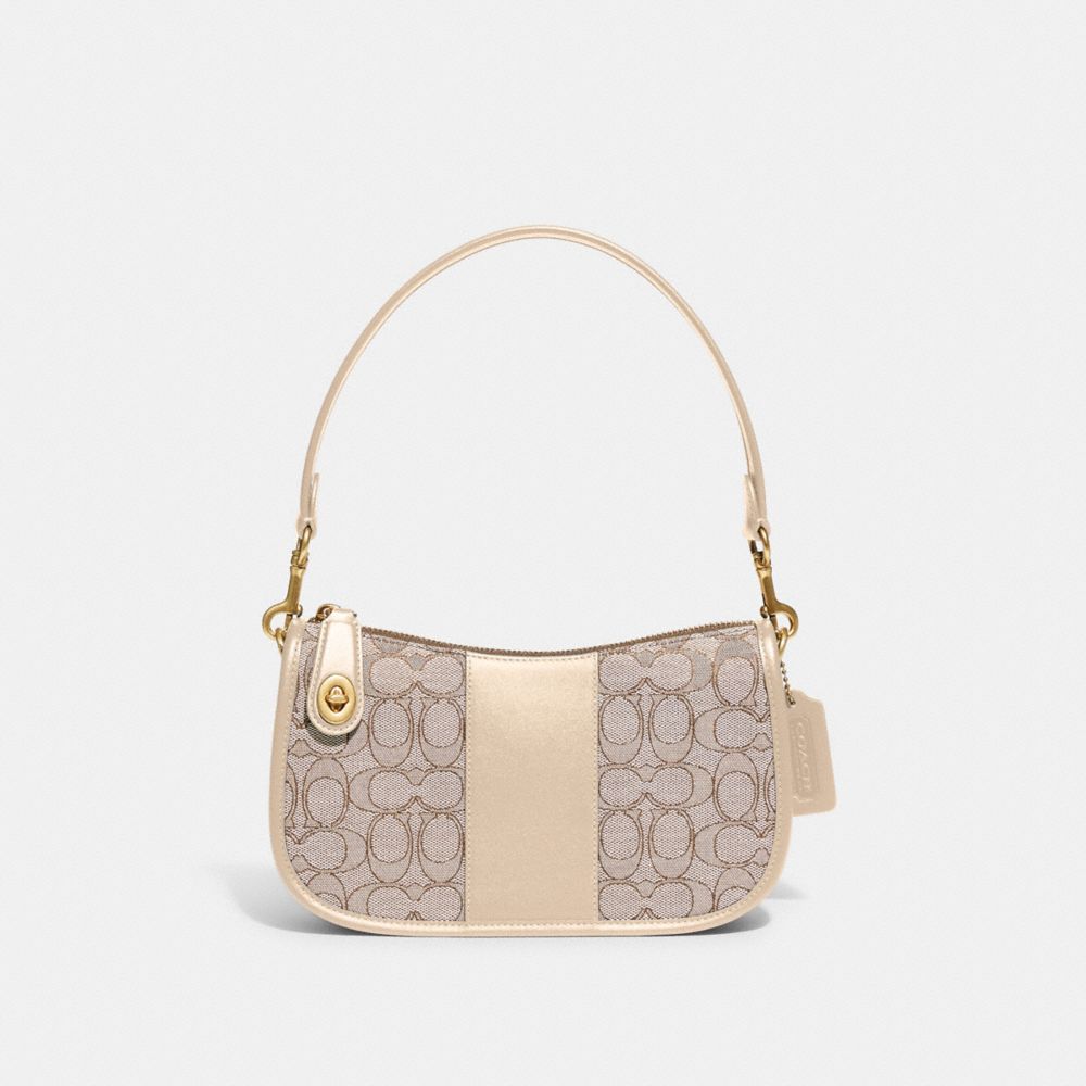 COACH®,SWINGER BAG IN SIGNATURE JACQUARD,Medium,Brass/Stone Ivory,Front View image number 0