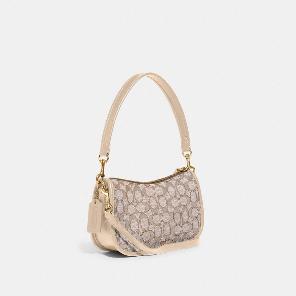 COACH®,Swinger Bag In Signature Jacquard,,Angle View