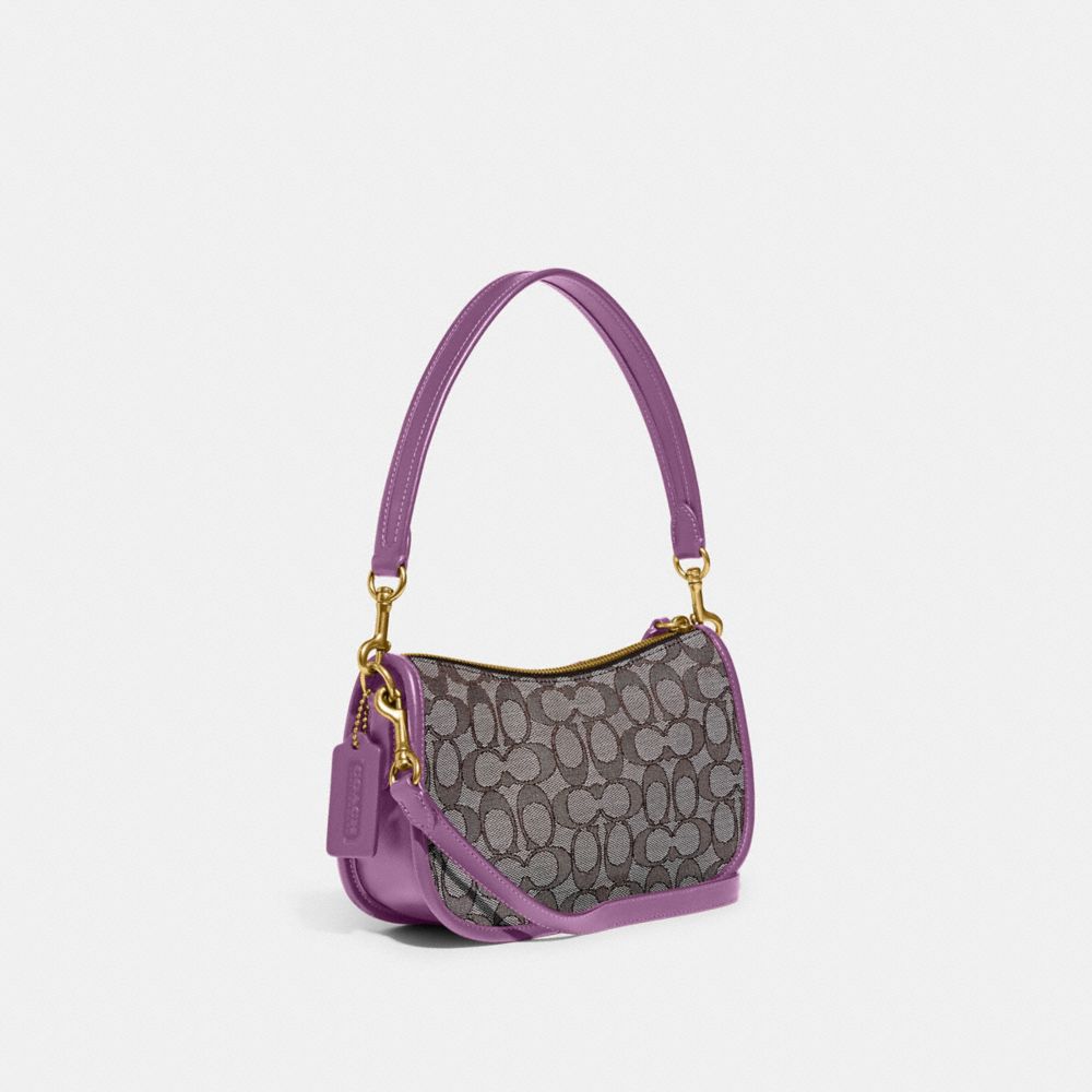 COACH®,Swinger Bag In Signature Jacquard,,Angle View