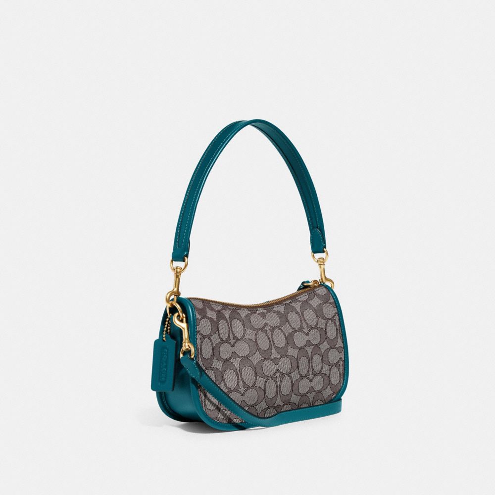 COACH®,Swinger Bag In Signature Jacquard,,Angle View