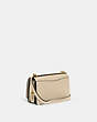 COACH®,BANDIT CROSSBODY,Leather,Brass/Ivory,Angle View