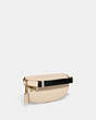 COACH®,COACH X MINT + SERF BETHANY BELT BAG,Refined Pebble Leather,Small,Brass/Ivory Multi,Angle View