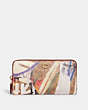 COACH®,COACH X MINT + SERF ACCORDION ZIP WALLET IN SIGNATURE CANVAS,Signature Coated Canvas,Brass/Tan Rust Multi,Front View