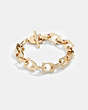 COACH®,CHUNKY SIGNATURE CHAIN LINK BRACELET,Brass,Gold/Pink,Front View