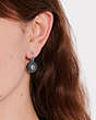 COACH®,SPARKLING DAISY HUGGIE EARRINGS,Metal,Silver/Black,Detail View