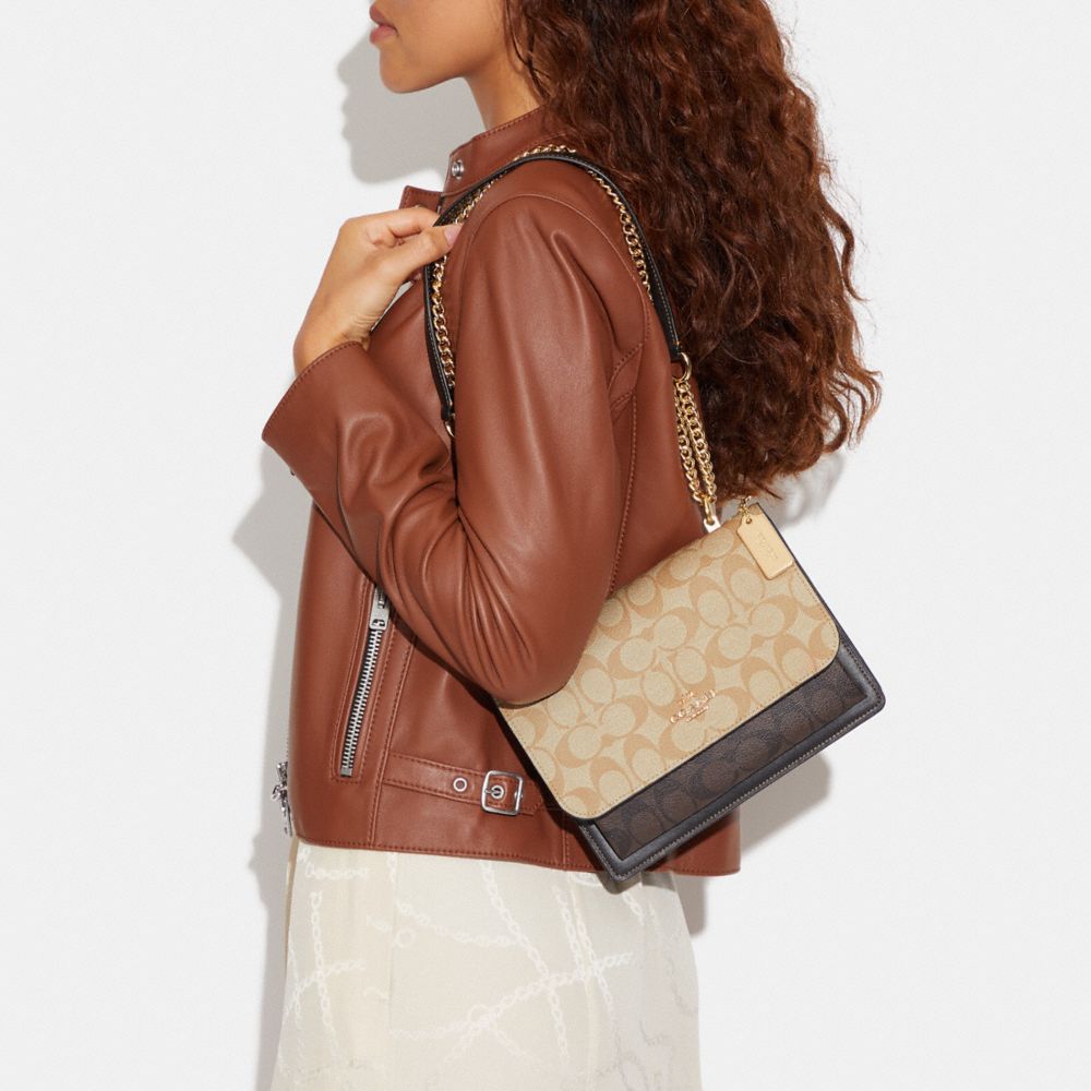 COACH®,Klare Crossbody Bag In Blocked Signature Canvas,Leather,Canvas,Crossbody,Color Block,Stitching,Adjustable,Day Party,Beige,Detail View