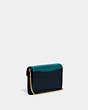 COACH®,TABBY CHAIN CLUTCH,Leather,Mini,Brass/Blue,Angle View