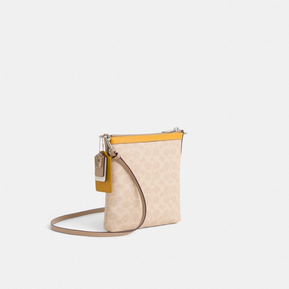 COACH®,Upcrafted Kitt Messenger Crossbody In Colorblock Signature Canvas,Leather,Canvas,Crossbody,Applique,Embroidered,Log...,Beige,Angle View